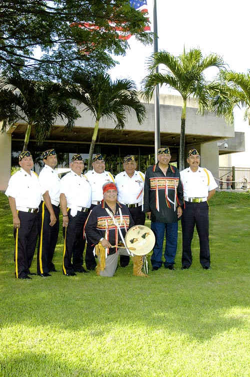 Ira H. Hayes Honor Guard, Sacaton, Arizona, and Pastor Dave Gomez from Jerusalem Center Church, Medford, Oregon, and Marshall TallEagle, creator of the Warroir's Medal of Valor, from Woodburn, Oregon, at the U.S.S. Arizona Memorial front lawn, Deceber 7, 2006, participating in the 65th Annual Anniversary Celebration of the U.S.S. Arizona Memorial Services, Pearl City, U.S.S. Arizona Memorial, O'ahu, Hawaii © Mickey Cox 2006
